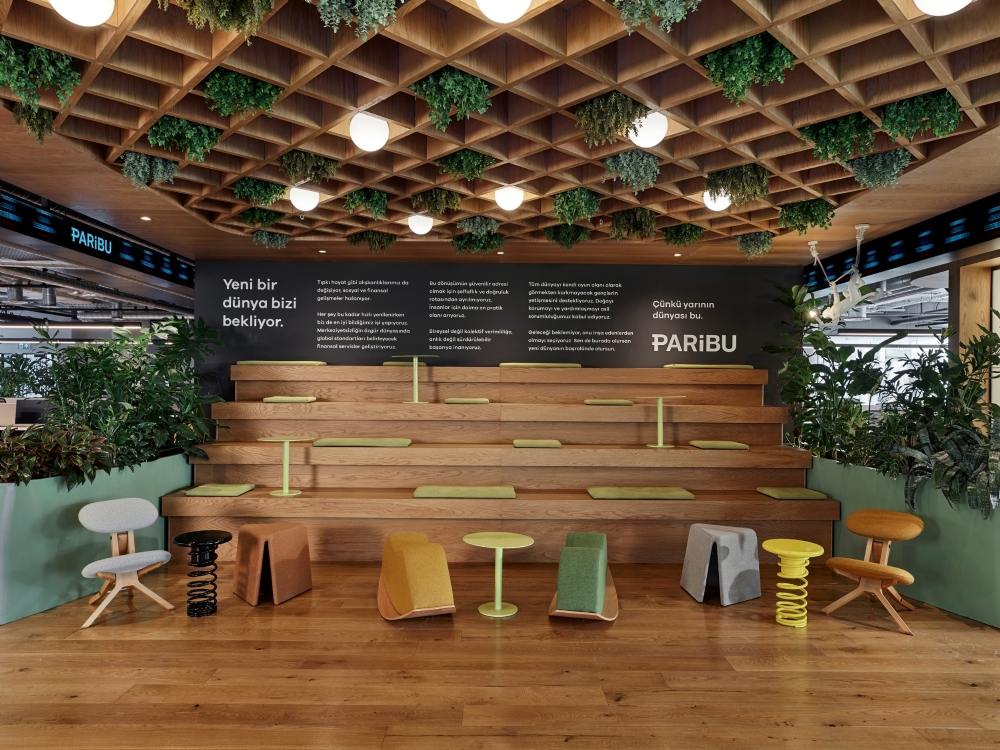 09- paribu-headquarters-interior-detail-material-amphi-seating-social-zone-lighting.jpg